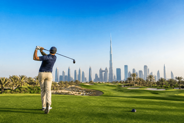 Golf course with UAE skyline backdrop