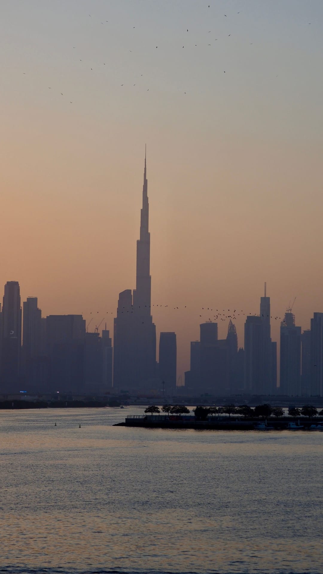 Dubai skyline at dusk near major malls